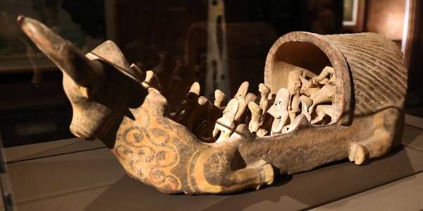 Terracotta Boat In The Shape Of A Bull, And Female Figurines