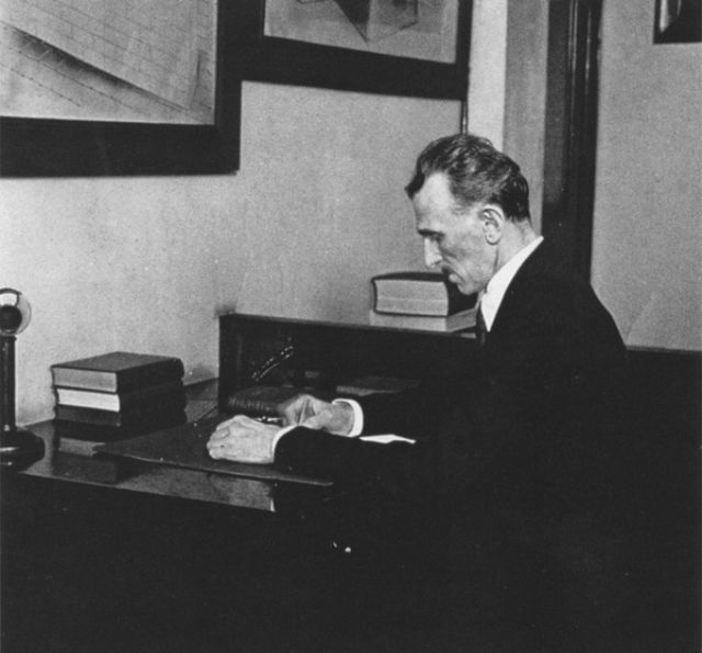 Tesla working in his office at 8 West 40th Street.
