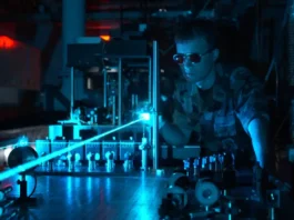 A Military Scientist Operating a Laser in a Test Environment. | Credit: United States Air Force.