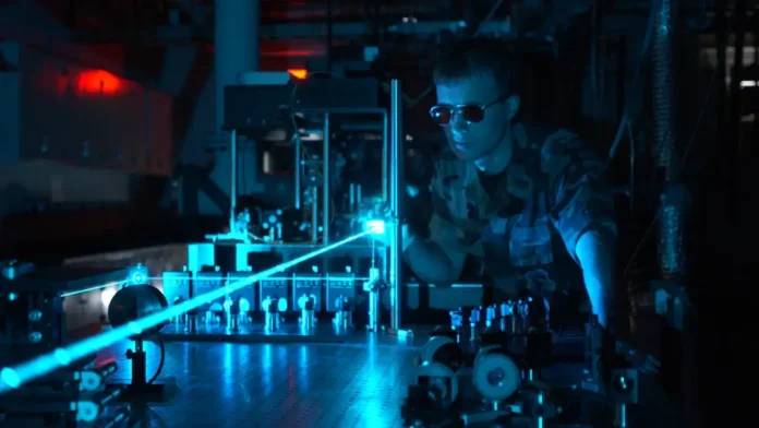 A Military Scientist Operating a Laser in a Test Environment. | Credit: United States Air Force.