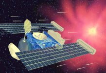 An artistic illustration of Stardust at comet Wild 2